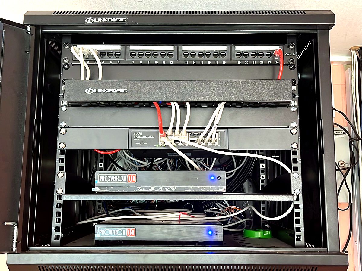Ventura-Tech installed wall cabinet with patch panels, switch and Provision-ISR CCTV recorders